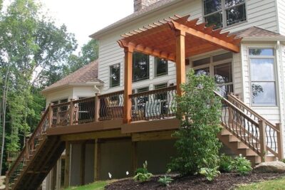 Elevated Deck With Wooden Pergola And Plants