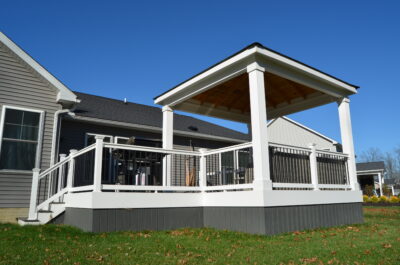 Gazebo With White Railings And Deck