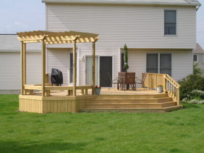 Wooden Deck With Pergola And Seating Area