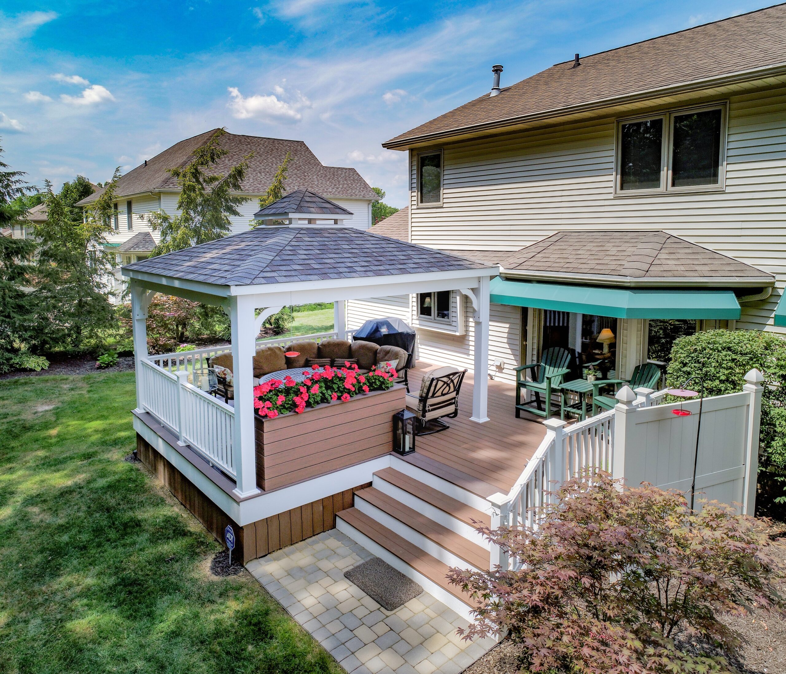 Outdoor Deck With Pergola And Seating Area