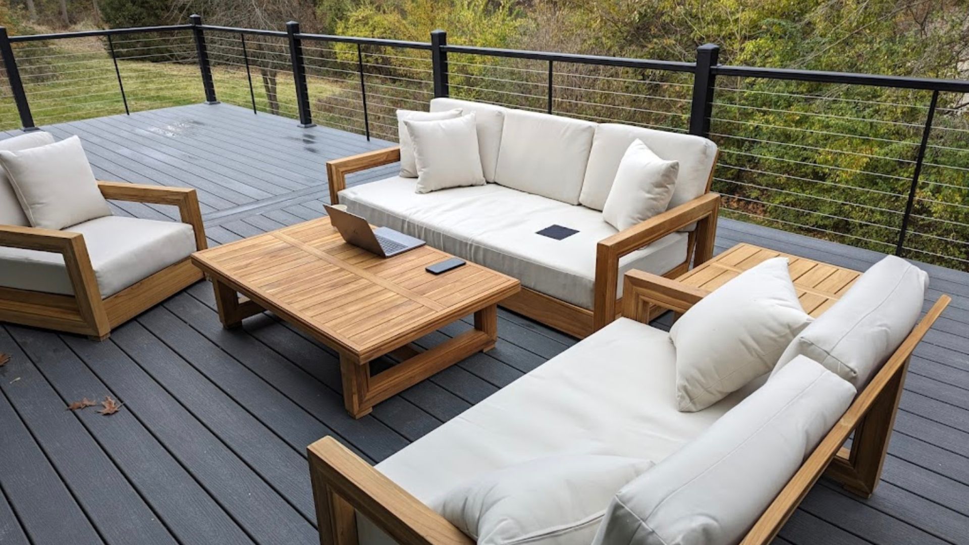 Multi-Level Deck With Composite Boards And Black Cable Railing
