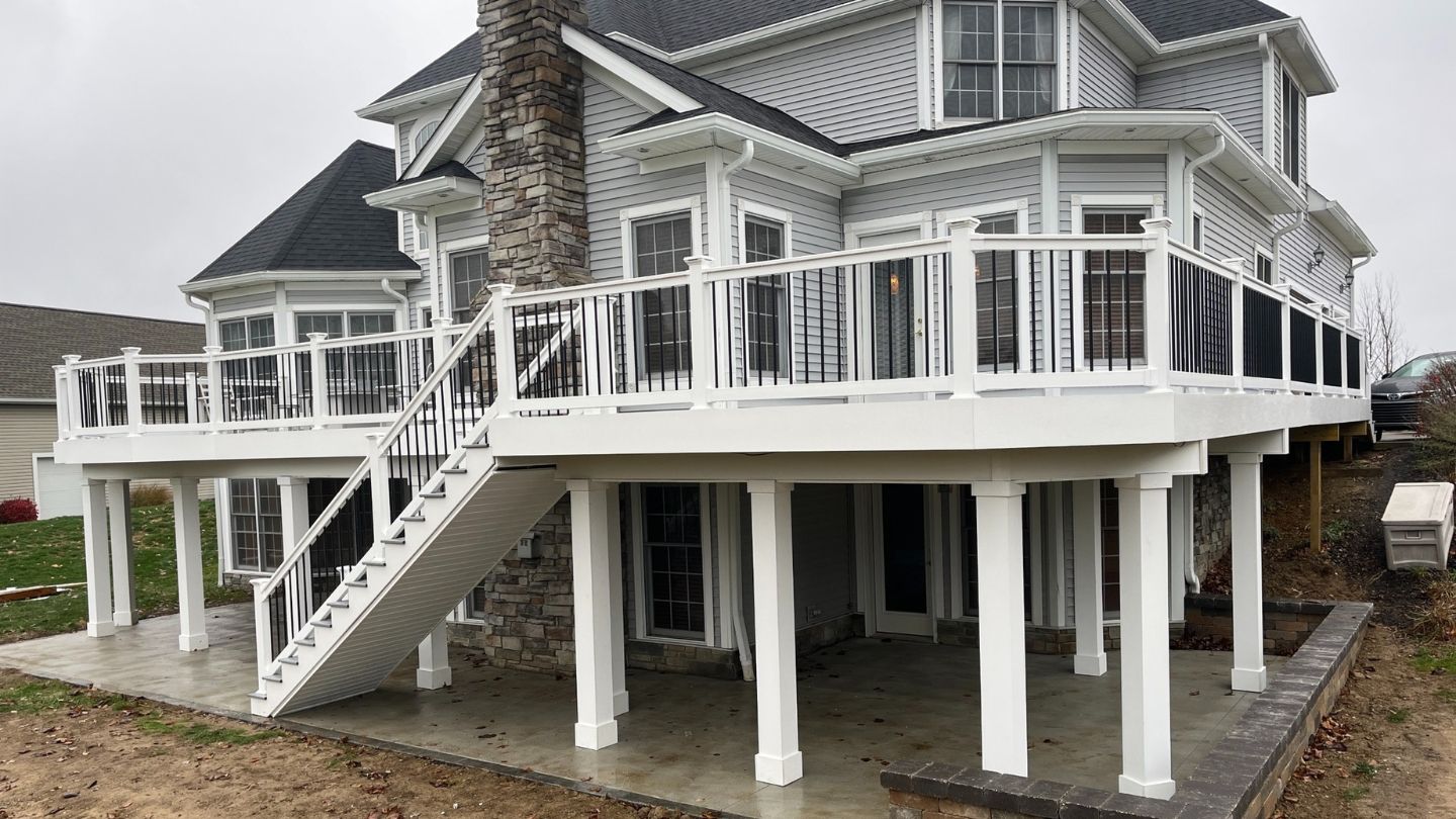 Elevated White Composite Deck With Stairs